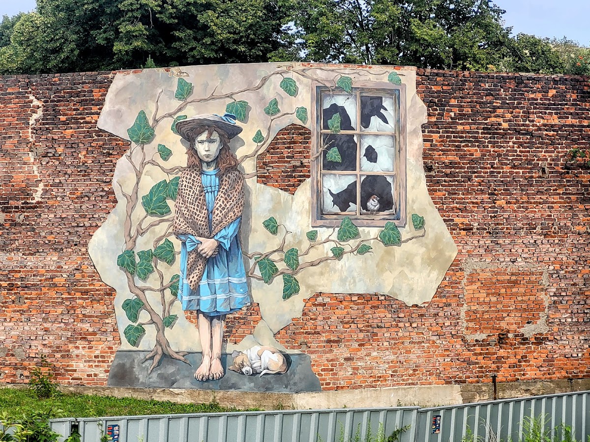 mural - Dziewczynka z fotografii Włodzimierza Pfeiffera - Piotr Saul i Damian Idzikowski, 2016
